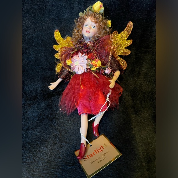 Delicate angle. Beautifully done. The doll has moving legs and arms. - Picture 1 of 3